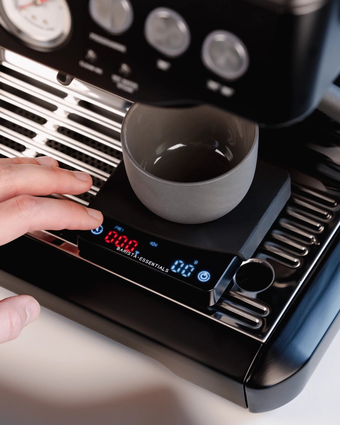 Mini coffee scale from Barista Essentials on Sage Barista Express with cappuccino cups