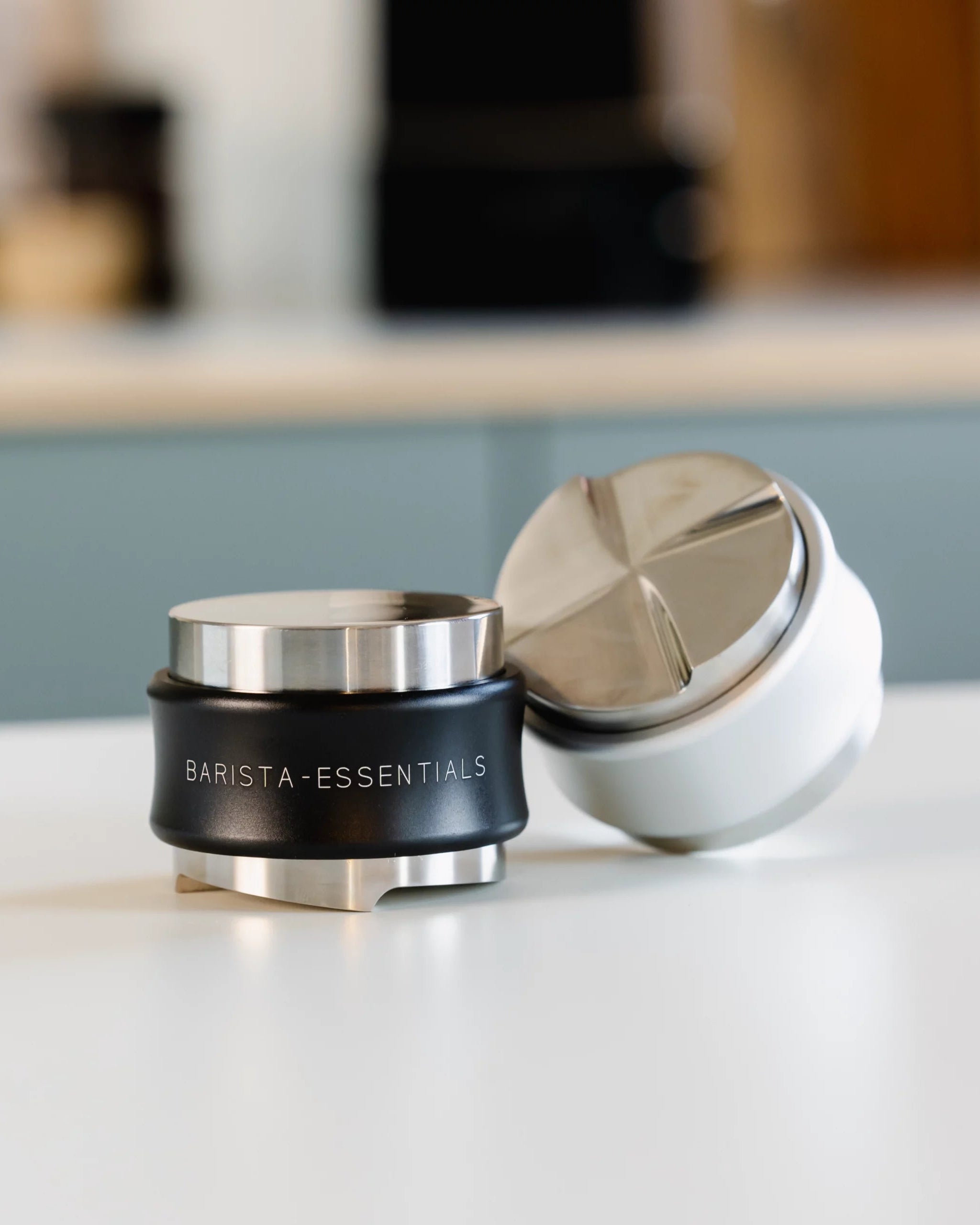 Combination tool with palm tamper and coffee distributor for a portafilter