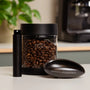 Includes RDT spray, dosing tray and vacuum storage container for coffee beans.